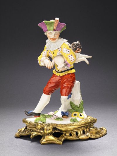 Harlequin with pug as hurdy-gurdy