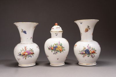 A rare set of three by Nymphenburg Bustelli vases with fruit decoration